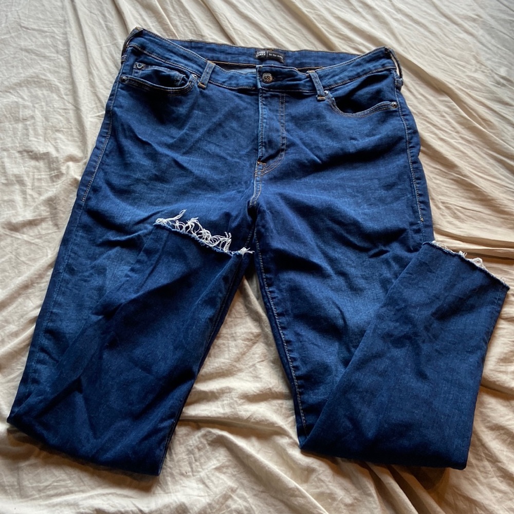 True religion mid rise skinny jeans with raw cut bottom hems